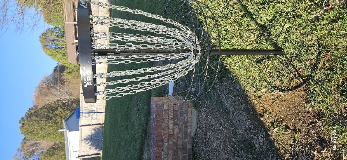 A real photo of MVP Black Hole Pro Disc Golf Basket by Great Basket (1)